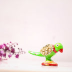 Stone-Studded Parrot Figurine – 1 inch — Bright green with a red beak and gold-tone studded wing