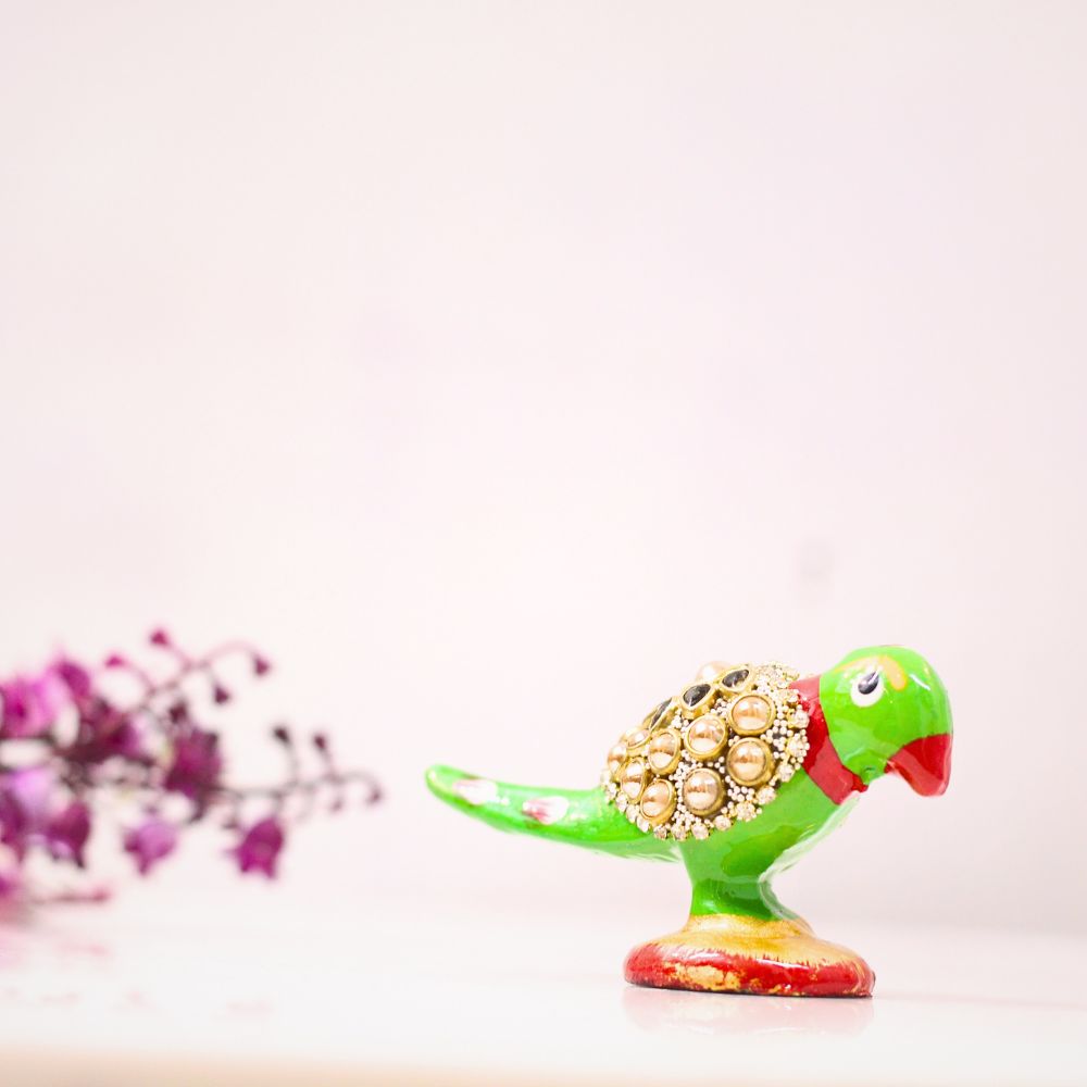 Stone-Studded Parrot Figurine – 1 inch — Bright green with a red beak and gold-tone studded wing