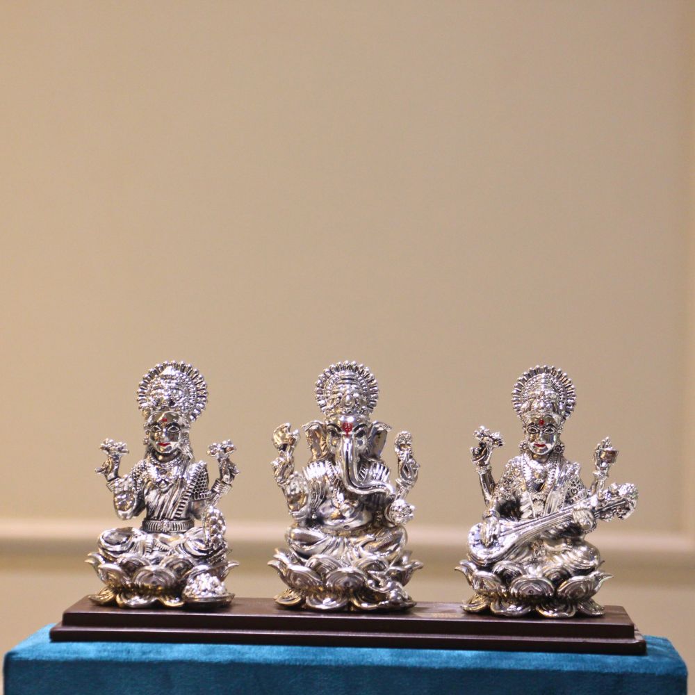 Laxmi Ganesh Saraswati Idol Set – Silver Finish, Boxed — Silver tone on a blue velvet base