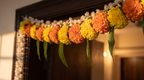Navratri close-up styling of the 11-Diya Door Toran, editorial campaign shot