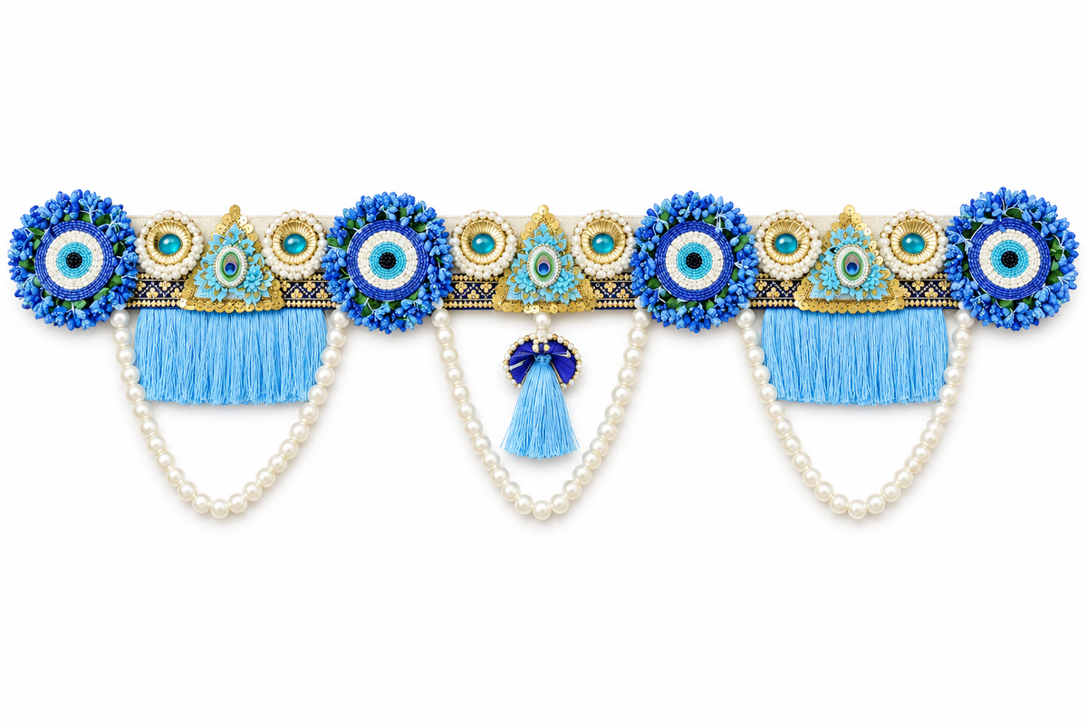 Blue floral beadwork toran with pearl swags on white