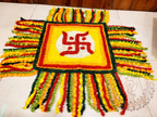 Dev Sthan floral cover laid flat with multicolour fringe