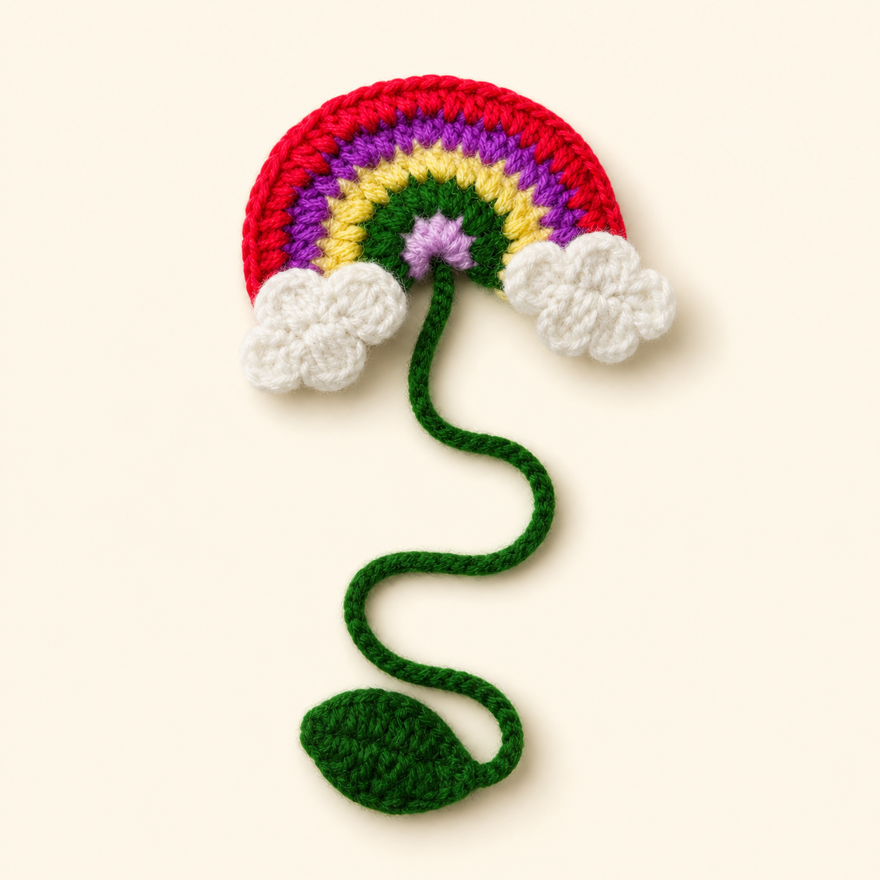 Rainbow handmade crochet flower bookmark, studio photo
