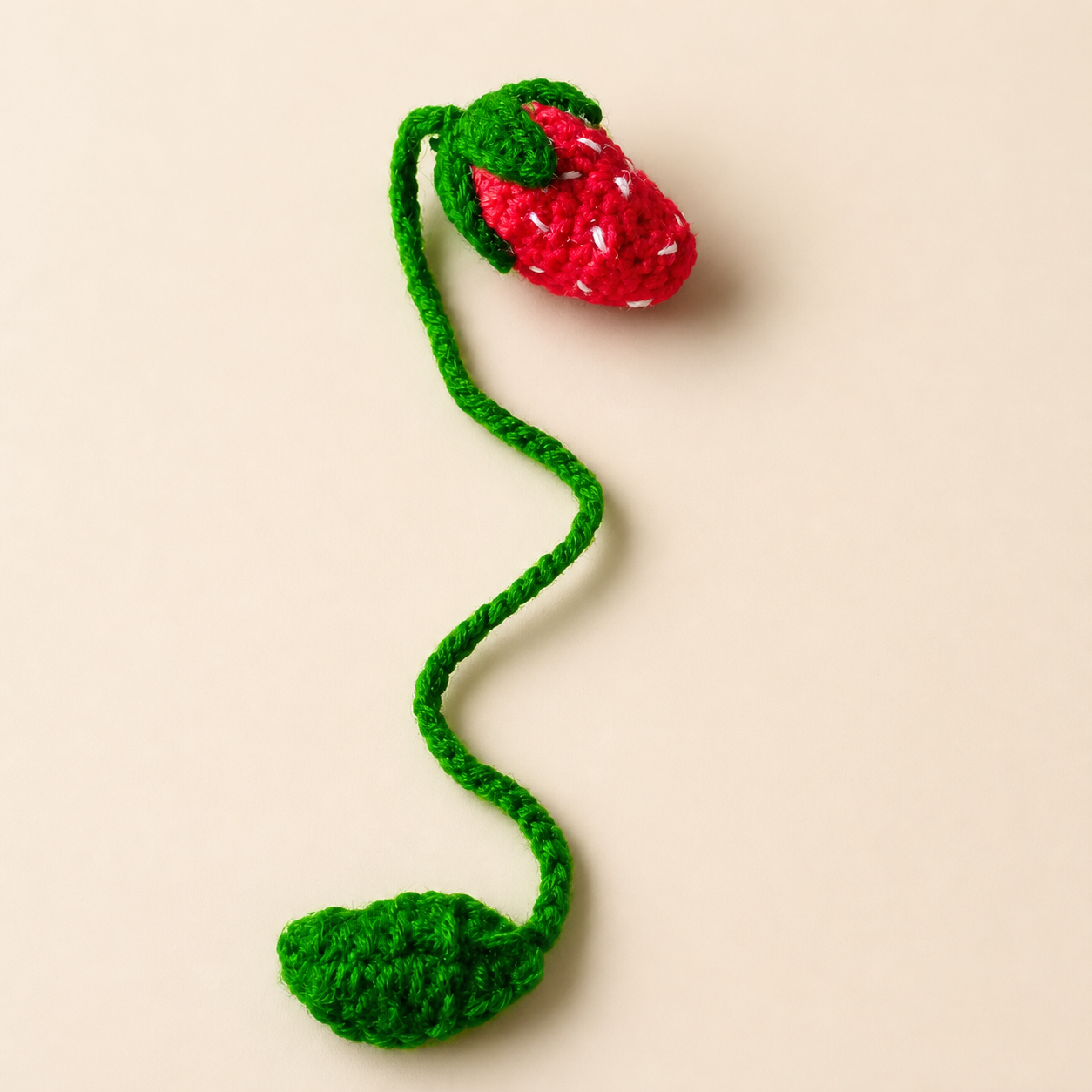 Strawberry handmade crochet flower bookmark, studio photo