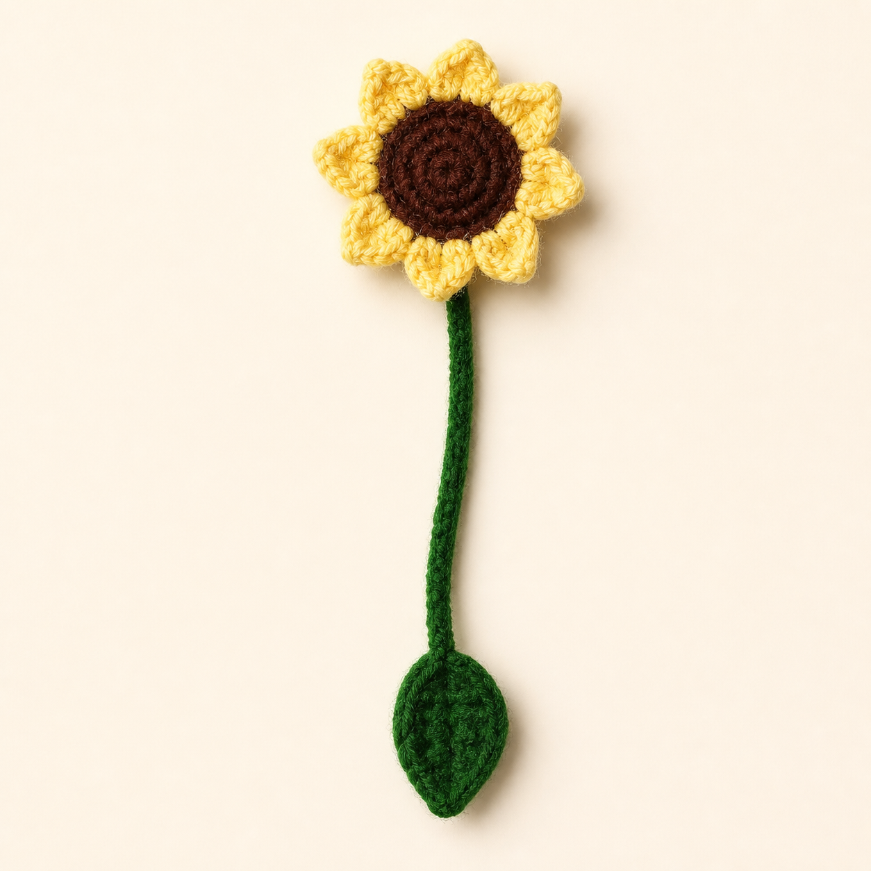 Sunflower handmade crochet flower bookmark, studio photo