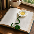 White Daisy crochet bookmark placed in an open book