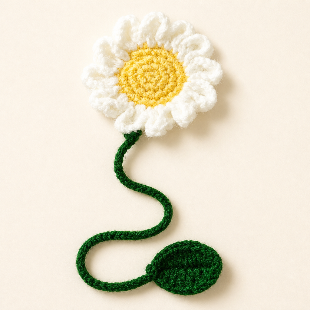 White Daisy handmade crochet flower bookmark, studio photo