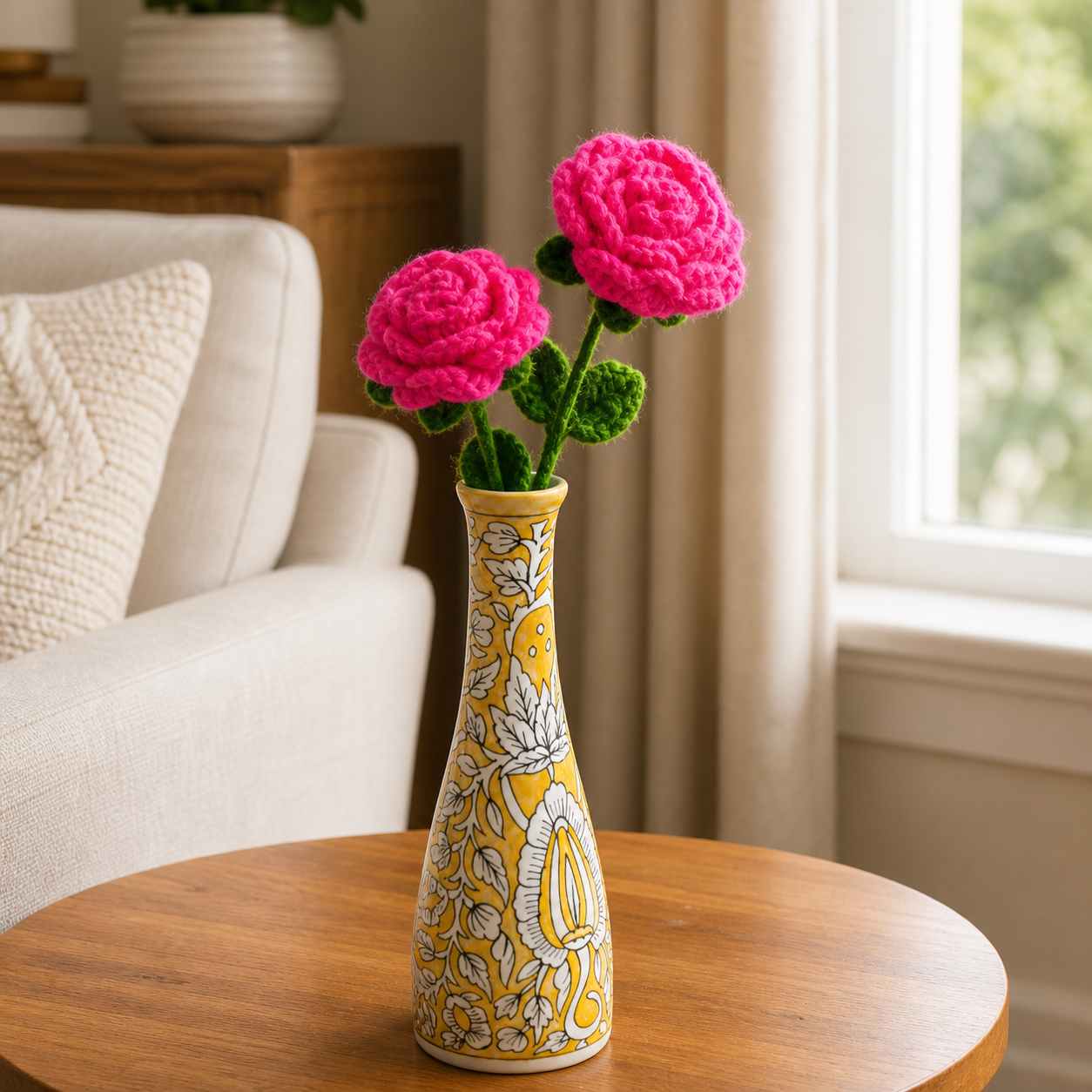 Crochet rose flower sticks displayed in a vase
