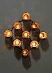 Star Jali Wall Tealight Holder – 9 Way — Antique gold tone on dark iron