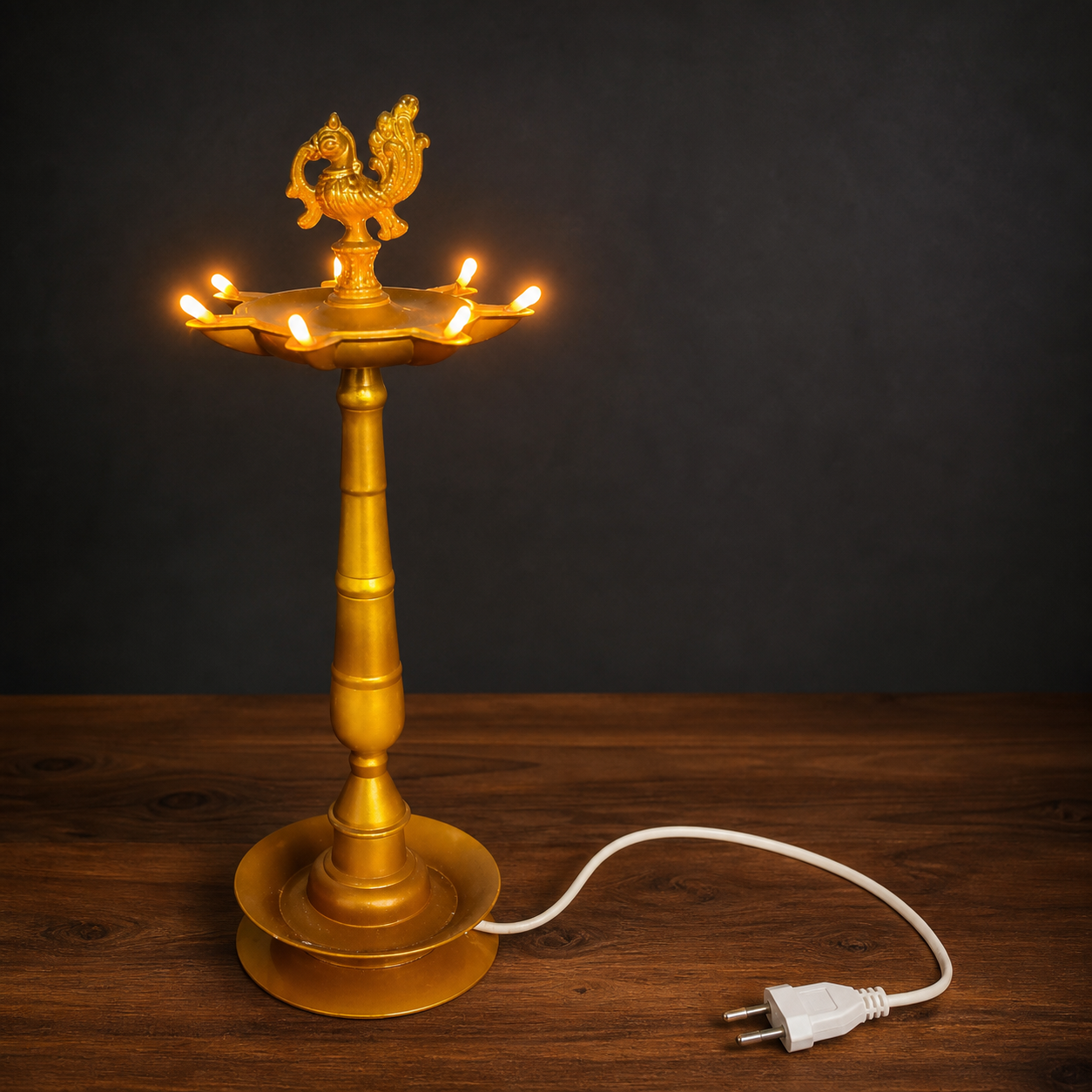 Divine Peacock Electric Diya illuminated on a dark background