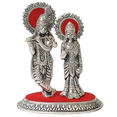 Radha Krishna Oval Frame Idol – Silver Finish — Silver tone with a red fabric backing