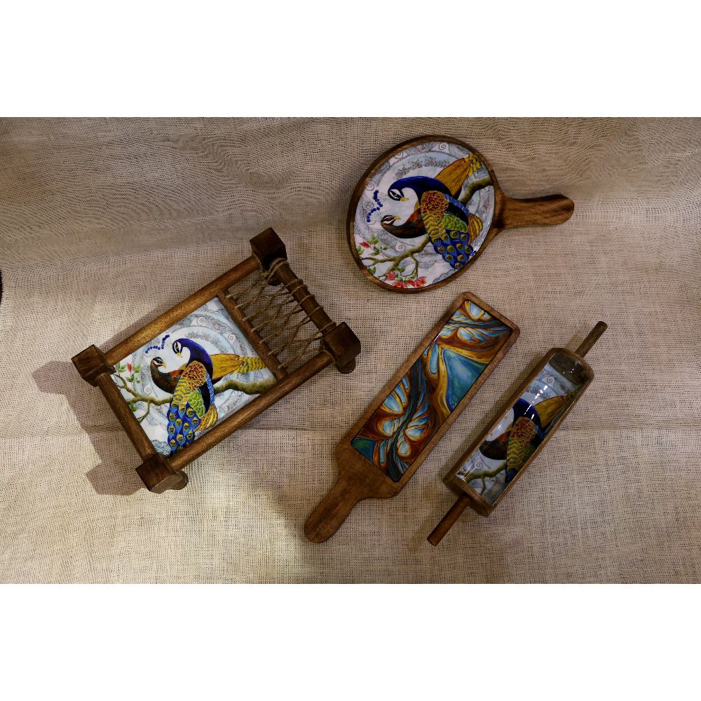 Painted Wooden Khatiya Platter Set – 4 Pieces — Hand-painted peacock motifs on natural wood