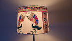 Close-up of hand-painted elephant motif lampshade
