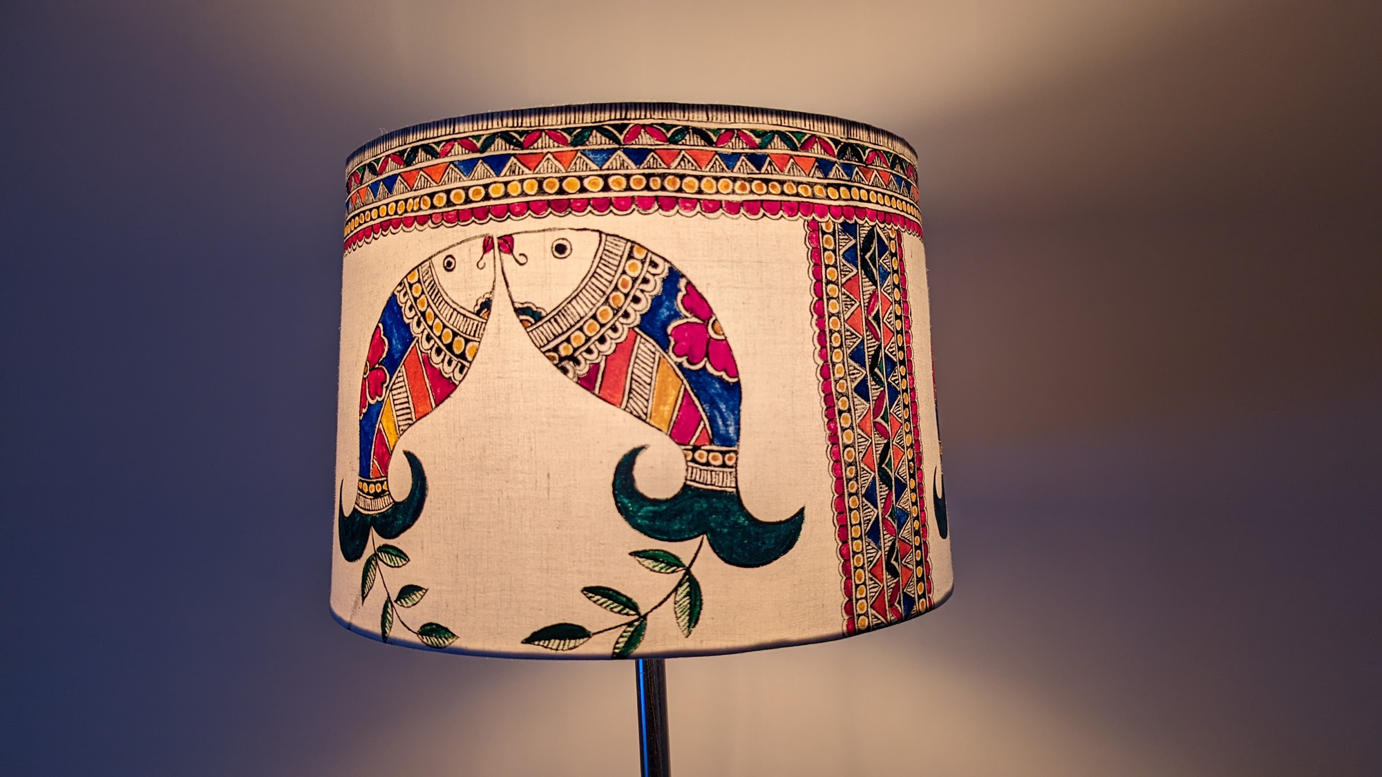Close-up of hand-painted elephant motif lampshade