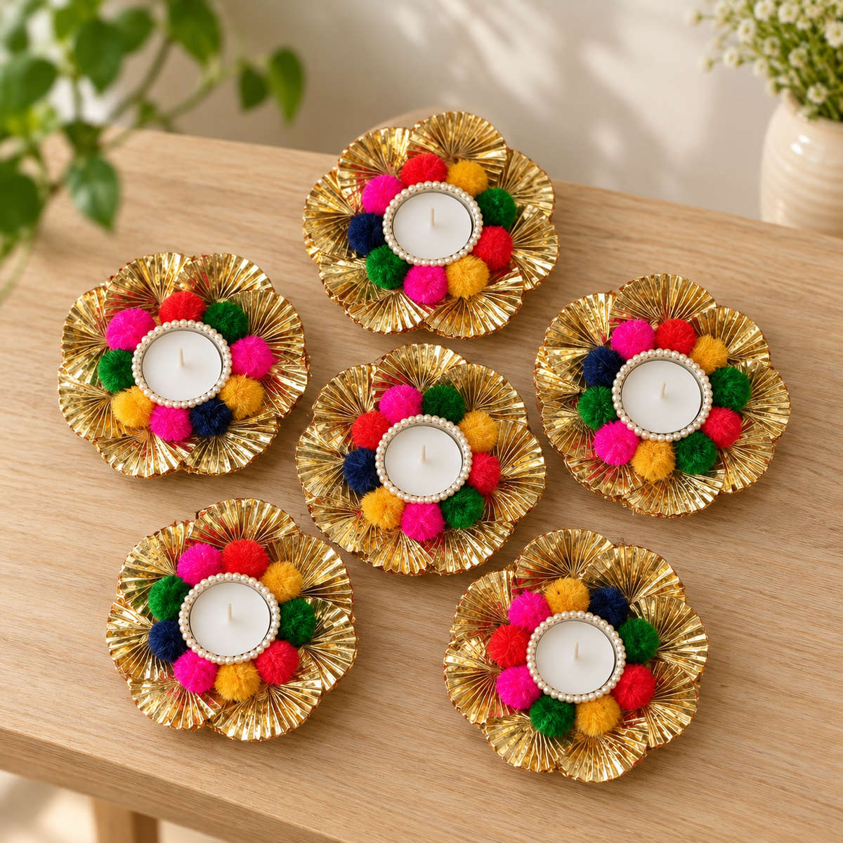 Multicolour pompom and gold flower tea-light holders - console pack of six