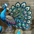 Close-up of printed peacock with turquoise stones set in golden filigree