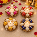 Set of four pearl and gold tea-light holders - festive