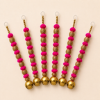 Six pink ghungroo hangings