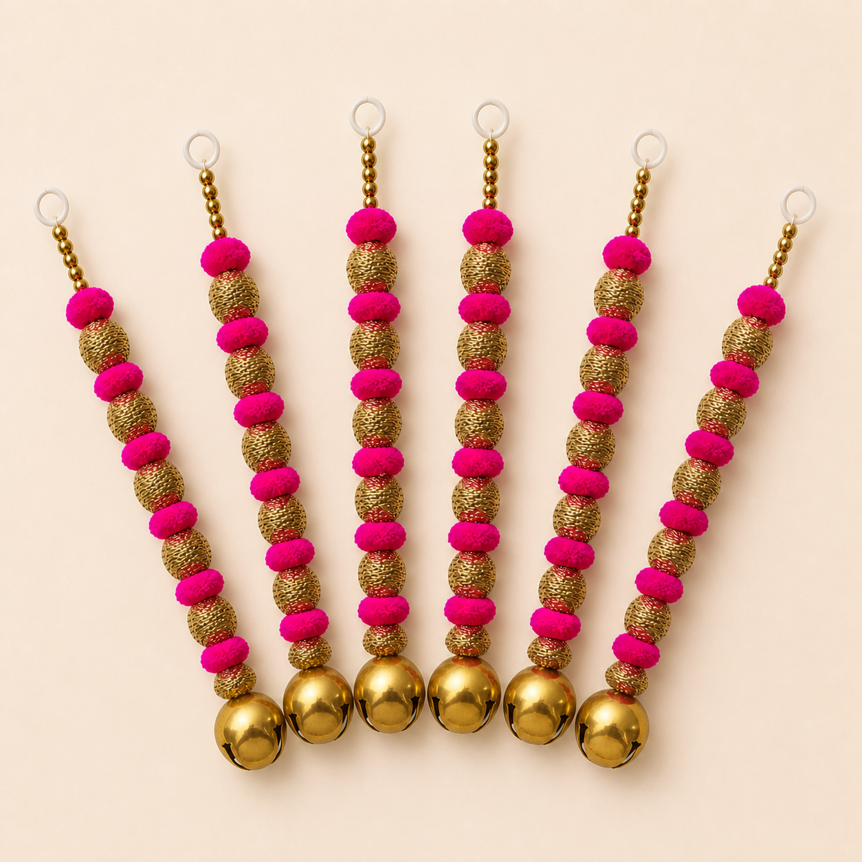 Six pink ghungroo hangings