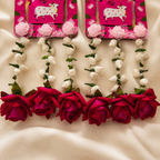 White bud strands and deep pink rose tassel detail
