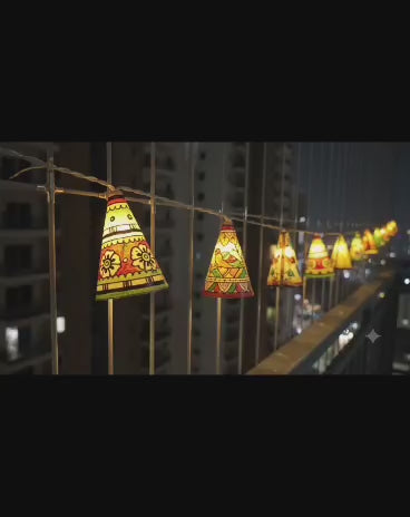Video of the hand-painted leather cone fairy lights
