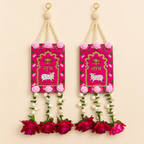 Full pair of red Shubh Labh door hangings with pink roses, pearl strands and flower tassels