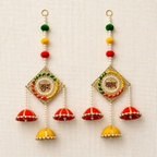 Full view of the handcrafted Shubh Labh door hanging pair on a neutral background