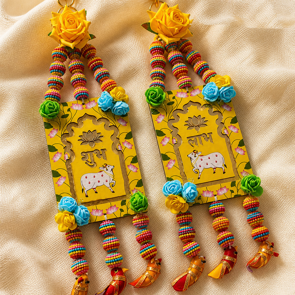 Detailed view of yellow floral Shubh Labh hanging pair with multicolour beads
