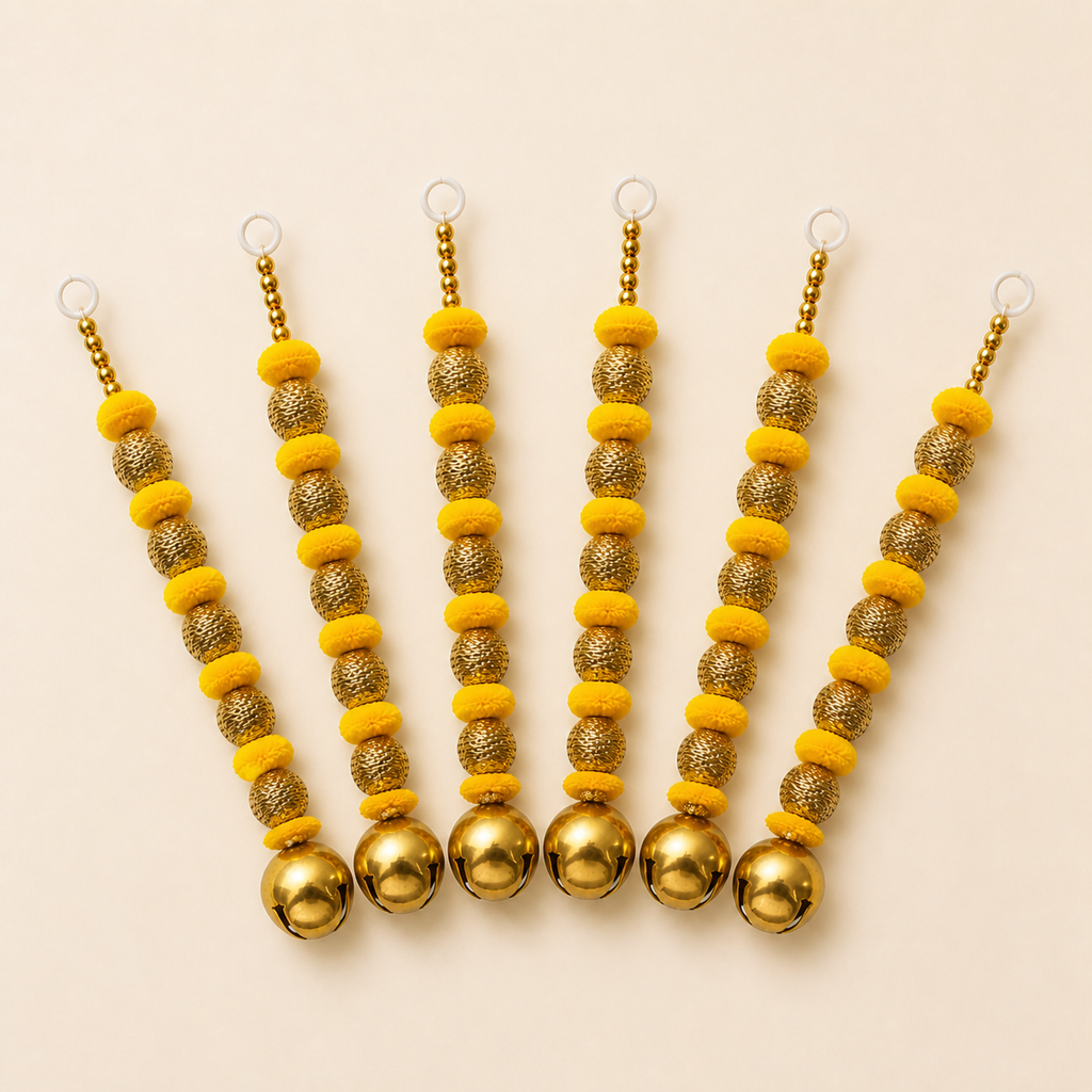 Six yellow ghungroo hangings